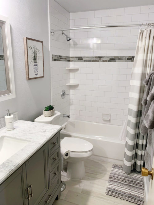 bathroom remodel with white subway tiles. Clean and crisp design.